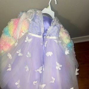 dress new never been used Is beautiful and coming with the skirt to up